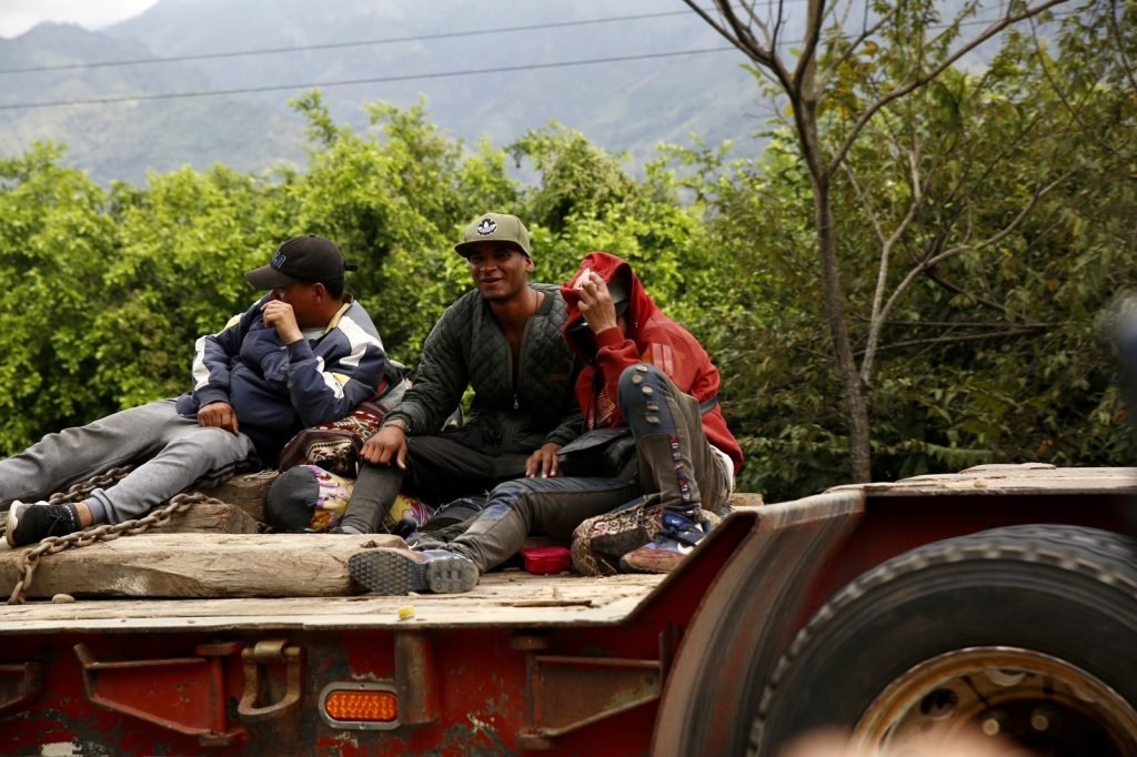 Migrants above a low bed on their way to Necocli Colombia were questioned where they were going and they responded to the United States.